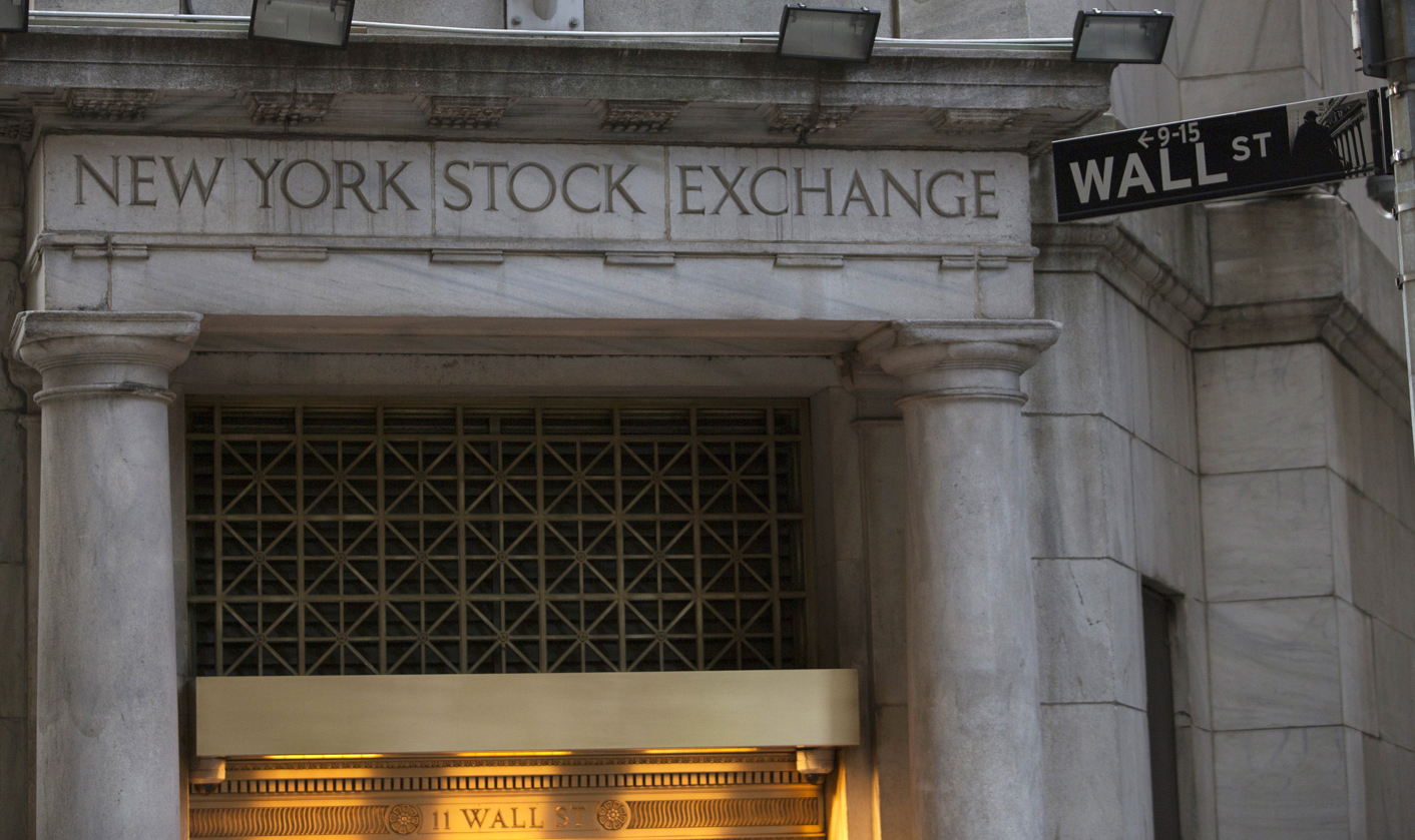 Wall St edges off 5-year high, awaits earnings