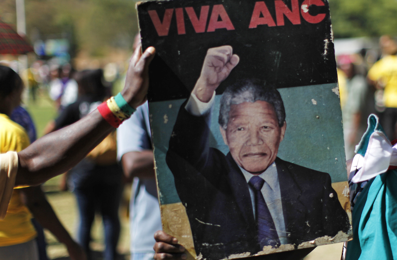 African National Congress supporters celebrate the 20th anniversary of Nelson Mandela's release at Drakenstein Correctional Centre, near Paarl