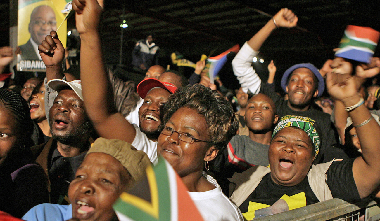ANC supporters chant slogans during victory celebrations at Nasrec in Johannesburg