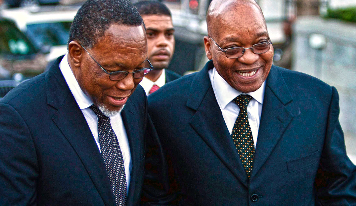 South African president-elect Zuma walks with President Motlandthe outside parliament in Cape Town