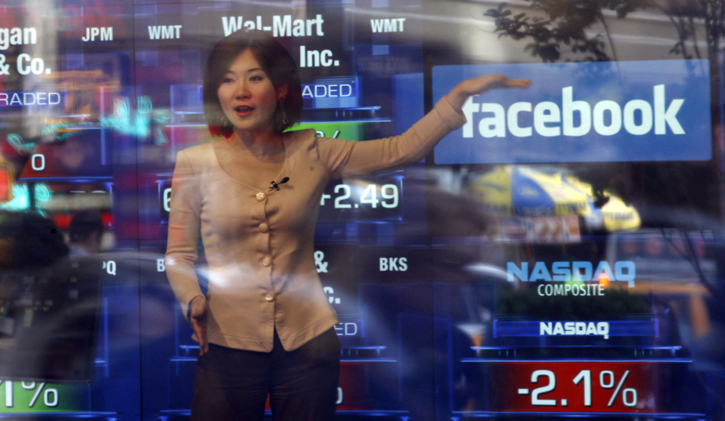 Facebook prices at top of range in landmark IPO