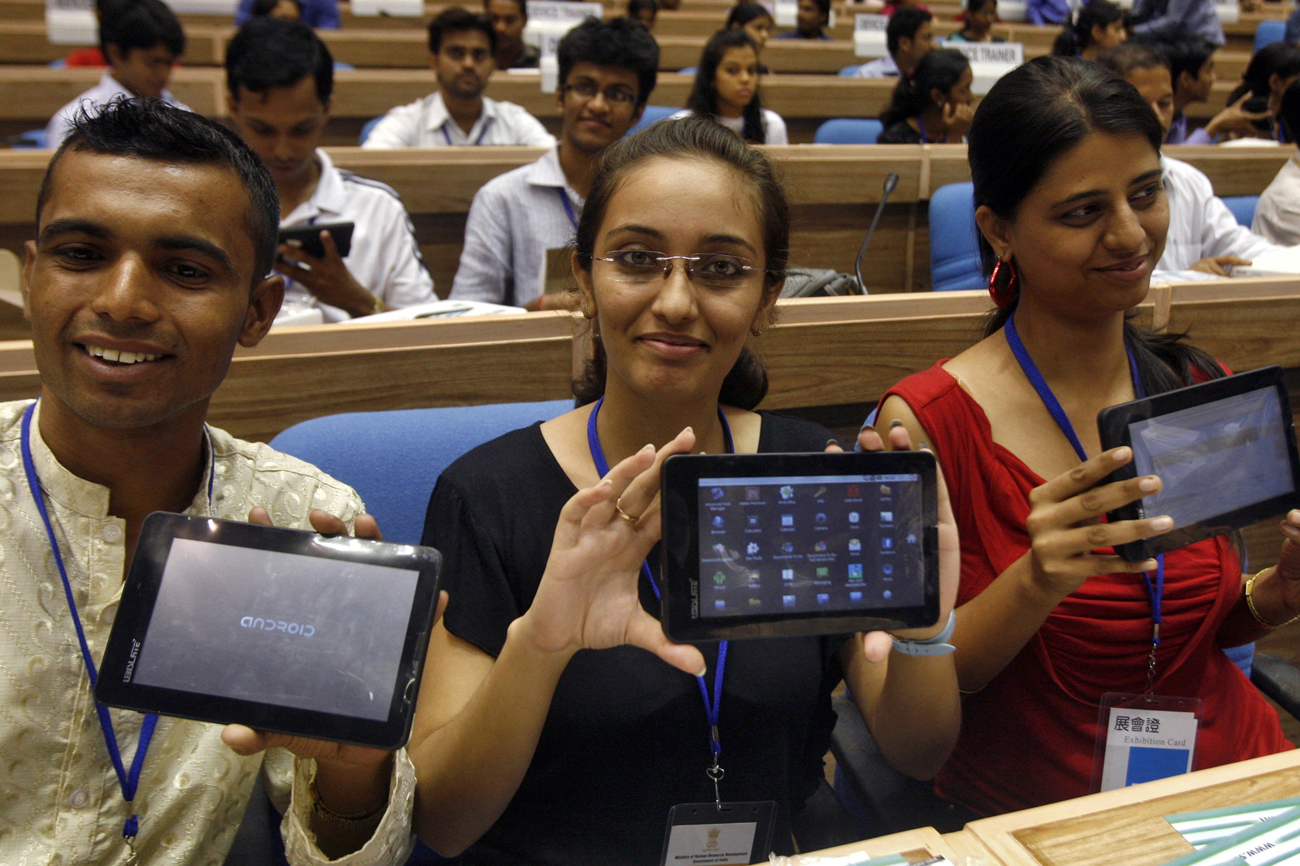 Students display Aakash after launching ceremony in New Delhi