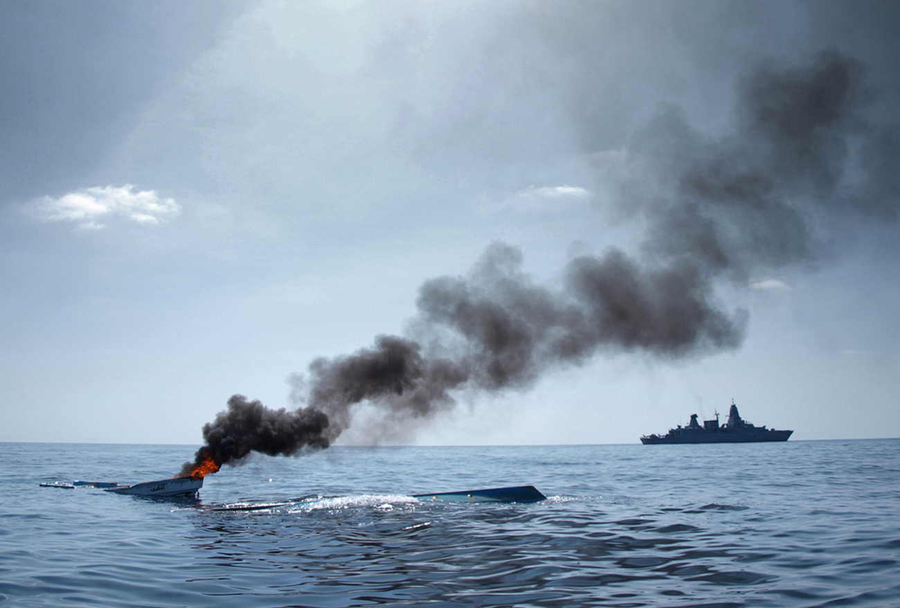 The German Frigate 'Hamburg' patrols after destroying fishing boats which were discovered floating keel side up off the coast of Somalia