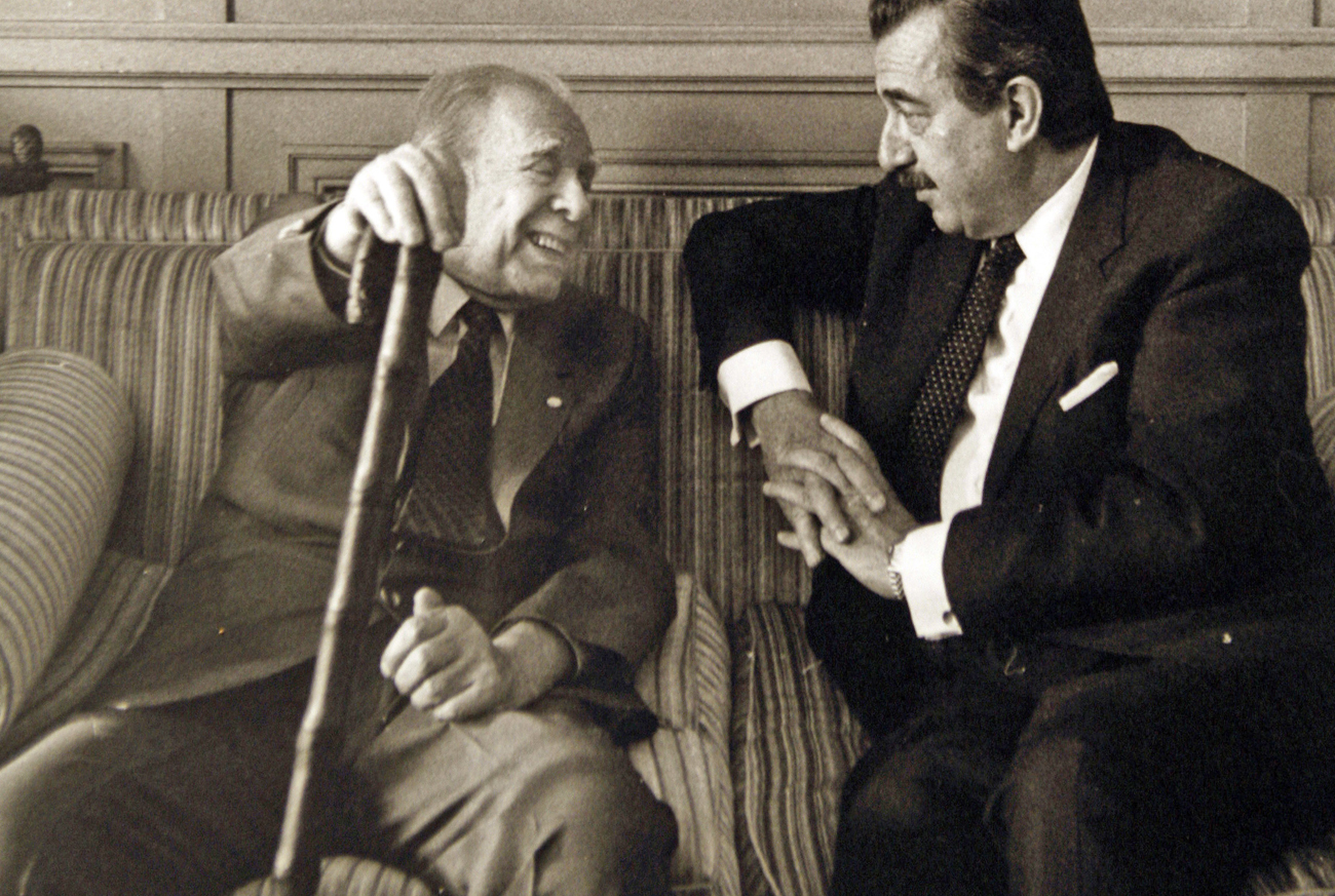 Undated file photo shows Argentine ex-president Alfonsin and Argentine writer Borges talking in Buenos Aires