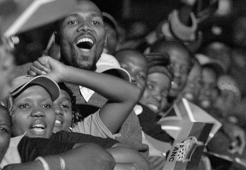 ANC supporters celebrate during victory celebrations at Nasrec in Johannesburg
