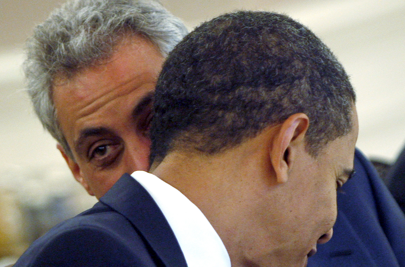 White House Chief of Staff Rahm Emanuel leans over to speak to U.S. President Barack Obama during an expanded meeting with Turkey's President Abdullah Gul in Ankara