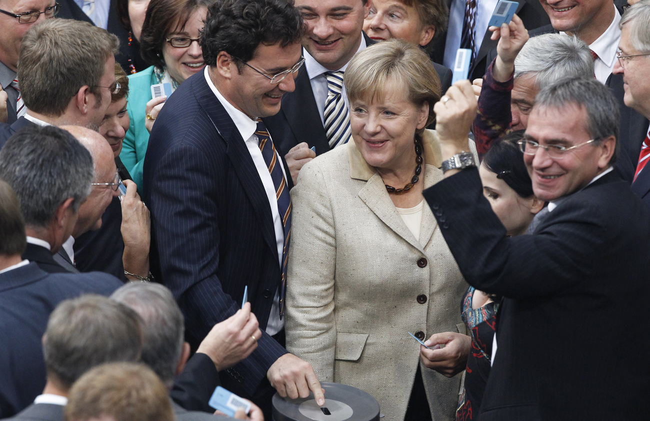 Angela Merkel lives through Parliament euro vote to die another day