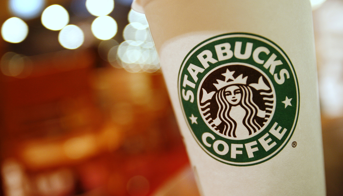Starbucks bows to pressure on UK tax