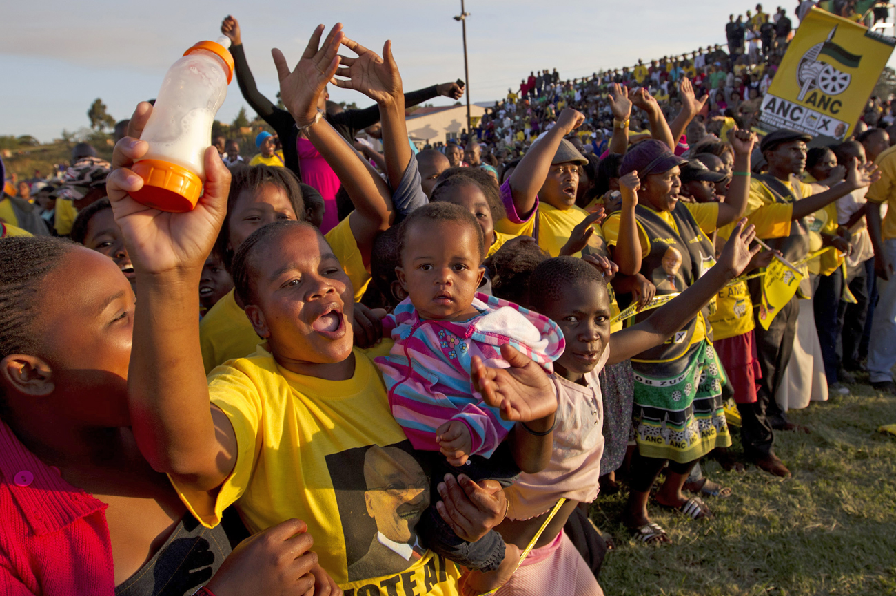 Supporters greet South African President Zuma as he campaigns in Richmond