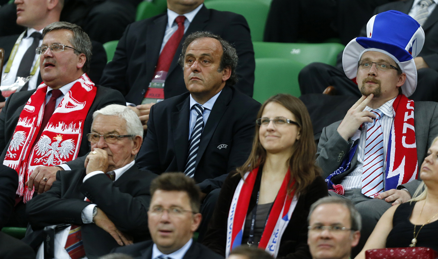 Poland's President Komorowski,  UEFA President Platini and Czech Republic's Minister of Transport, Pavel Dobes watch the Group A Euro 2012 soccer match between Poland and Czech Republic at the City Stadium in Wroclaw