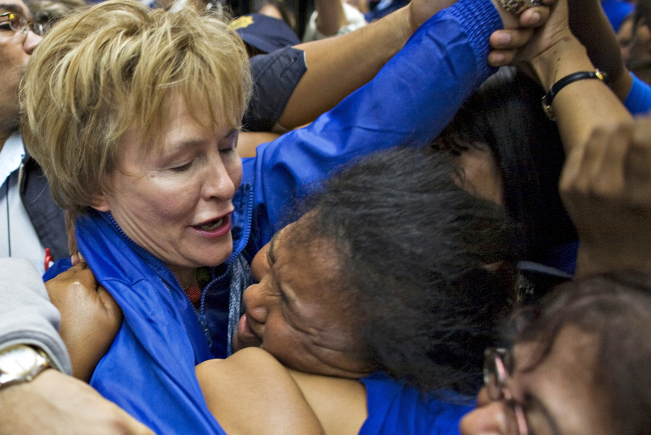 Democratic Alliance leader Helen Zille is mobbed by supporters as she arrives at Cape Town's airport