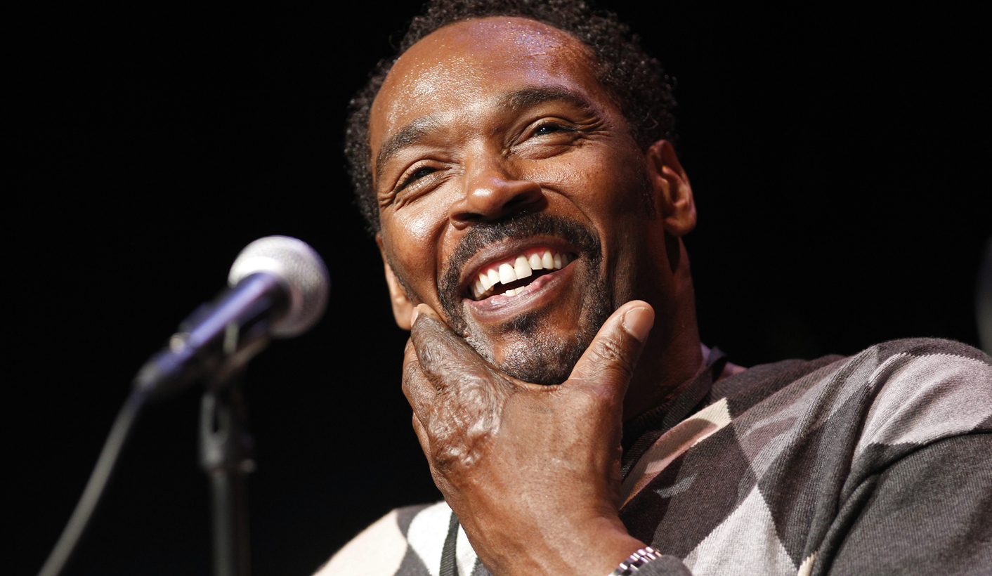Rodney King smiles during a discussion for his memoir at the Los Angeles Times Festival of Books on the USC campus in Los Angeles