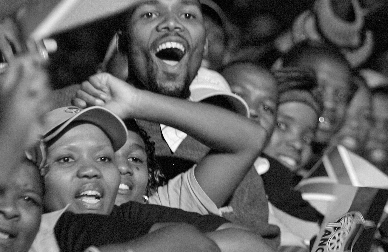 ANC supporters celebrate during victory celebrations at Nasrec in Johannesburg