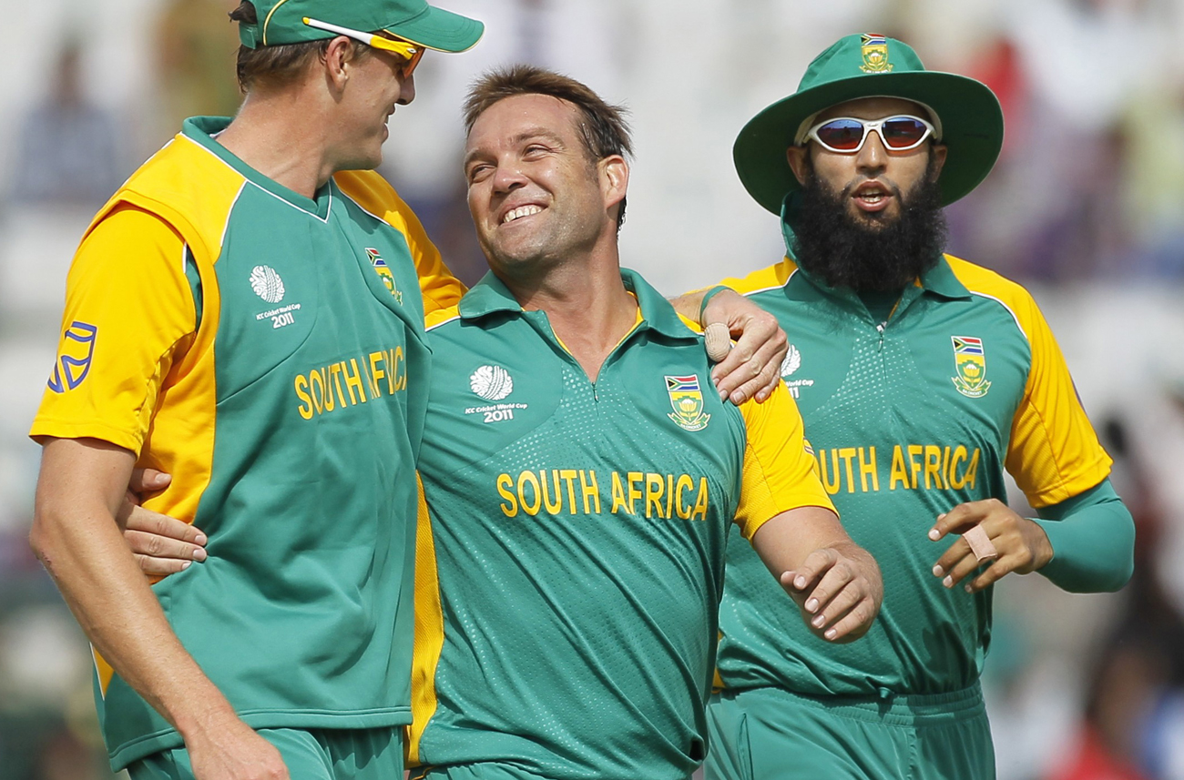 South Africa's Kallis celebrates with teammates after he took wicket of Netherlands' Cooper during their ICC Cricket World Cup group B match in Mohali
