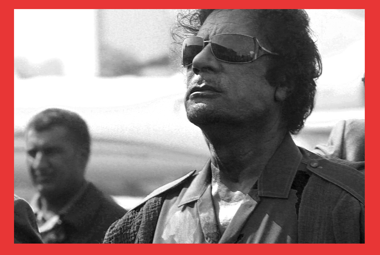 Libyan leader Muammar Gaddafi arrives at Khartoum airport