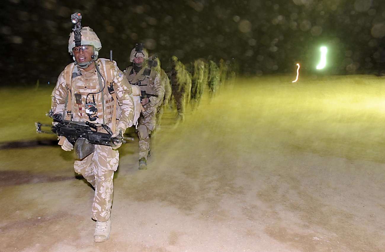 Bombs slow NATO advance in Afghan town