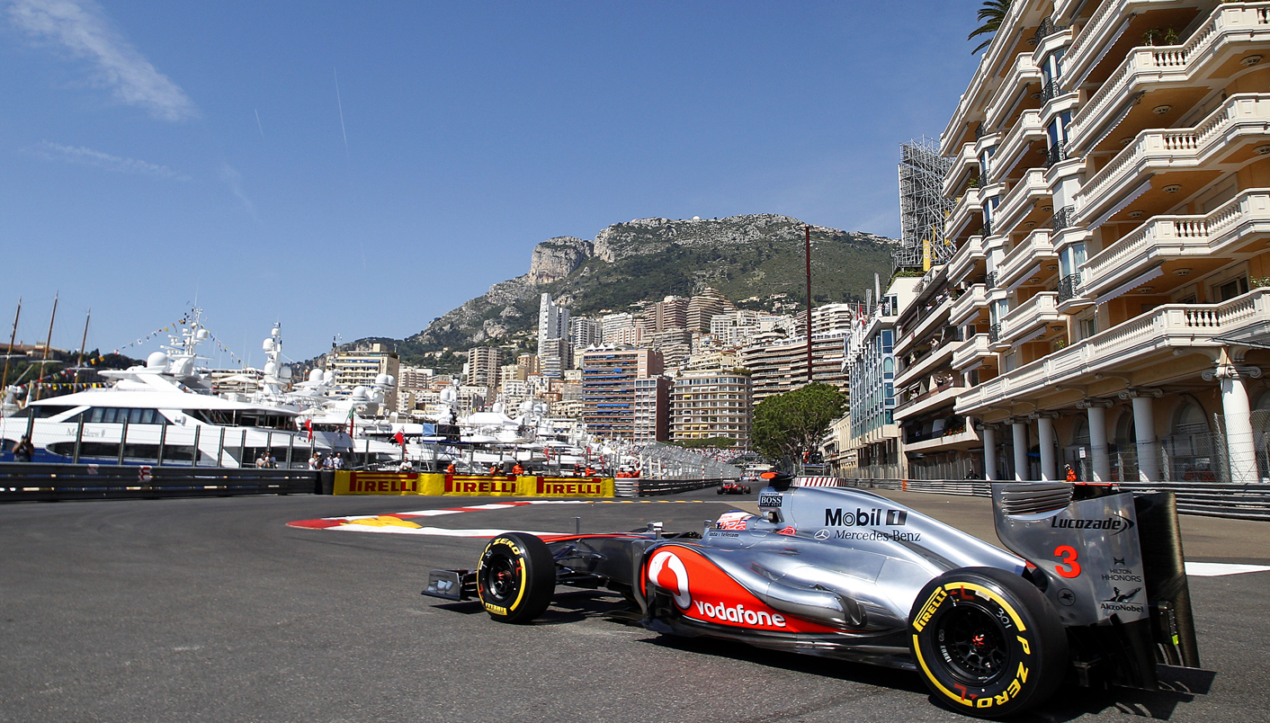 Motor racing-Button flies in wet Monaco practice
