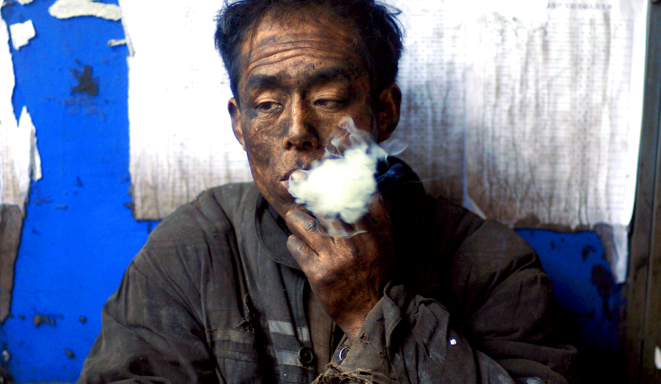 China, less impact by CO2 may explain slowing in warming