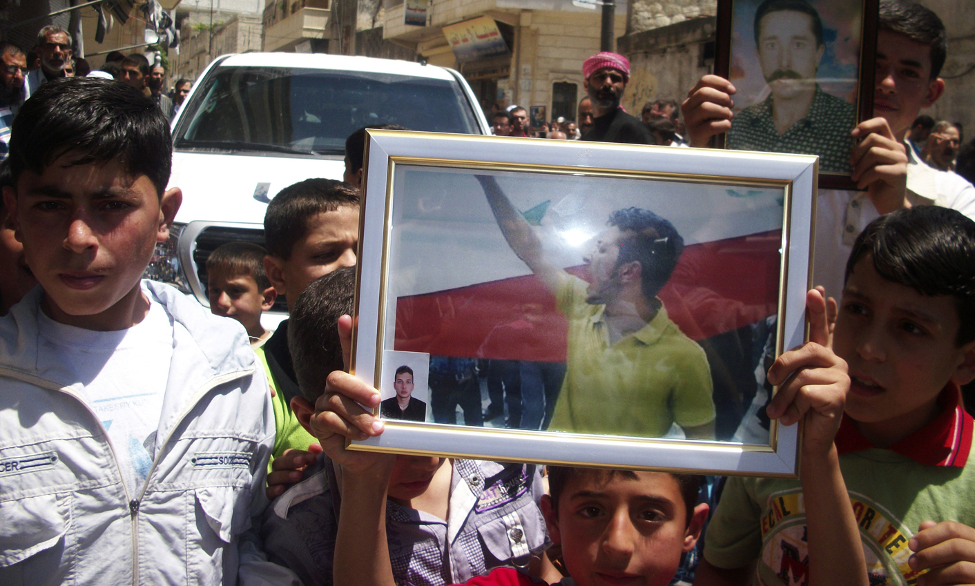 Assad faces new international pressure after massacre