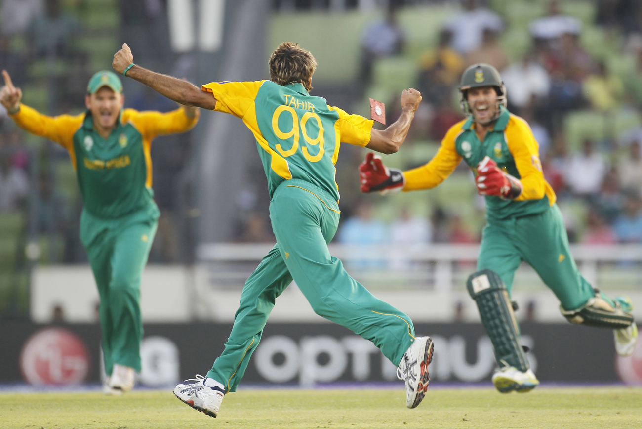 South Africa's Tahir celebrates taking the wicket of New Zealand's Ryder during their Cricket World Cup quarter-final match in Dhaka