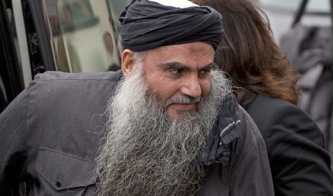 File photograph shows Radical Muslim cleric Abu Qatada, arriving back at his home after being released on bail, in London