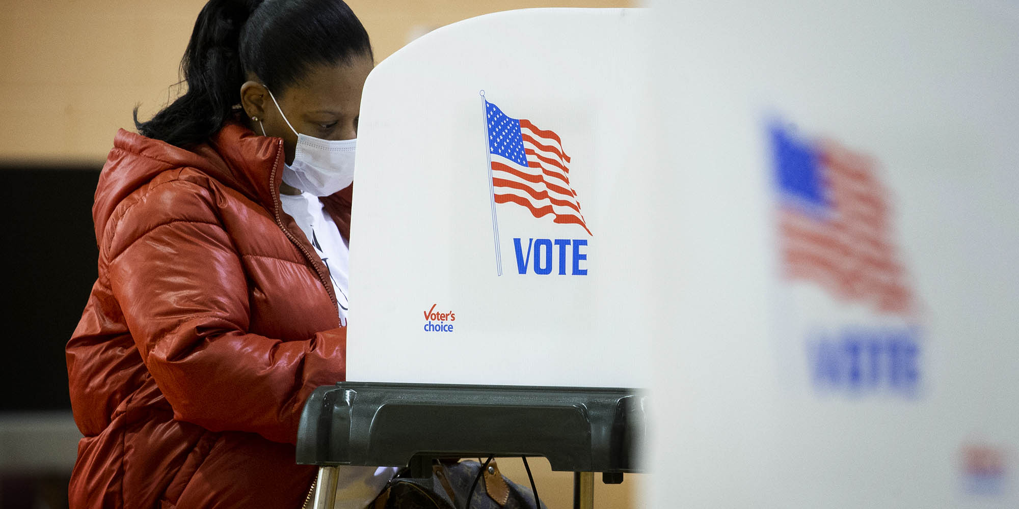Businesses board up and White House gets a high fence as Americans go to the polls today