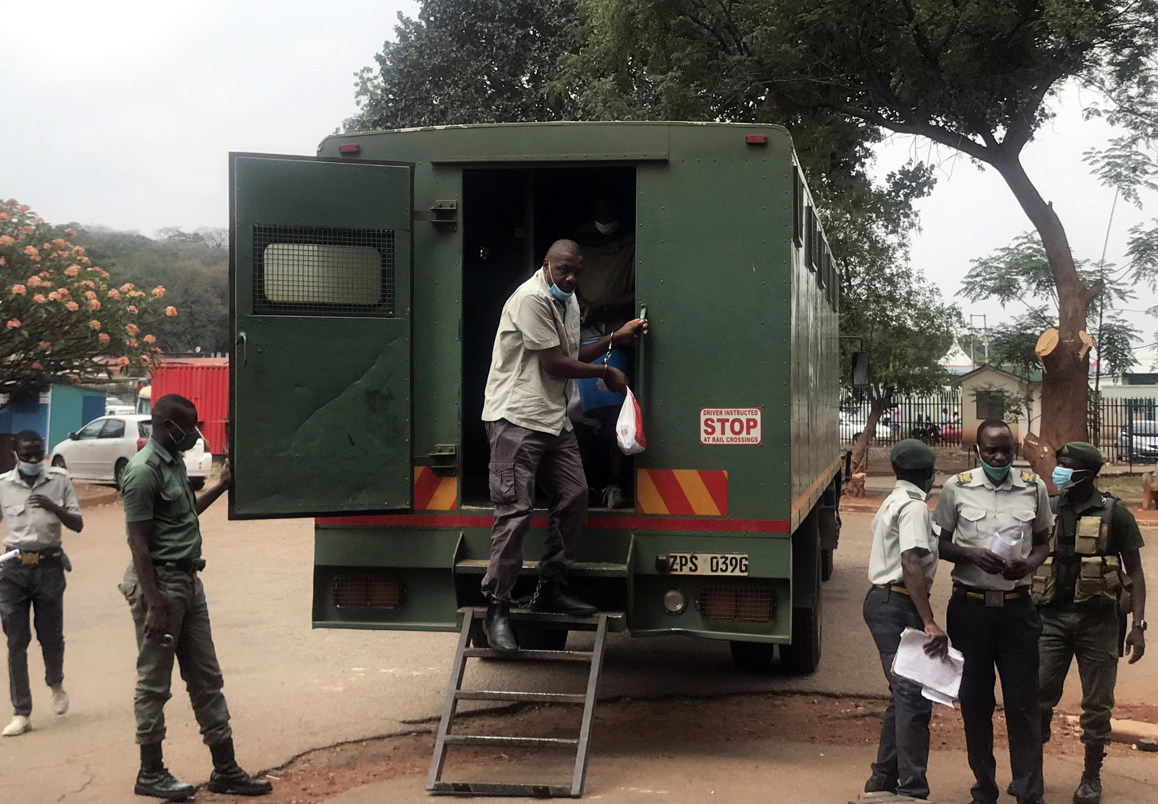 In court, in leg irons, Hopewell Chin’ono claims persecution