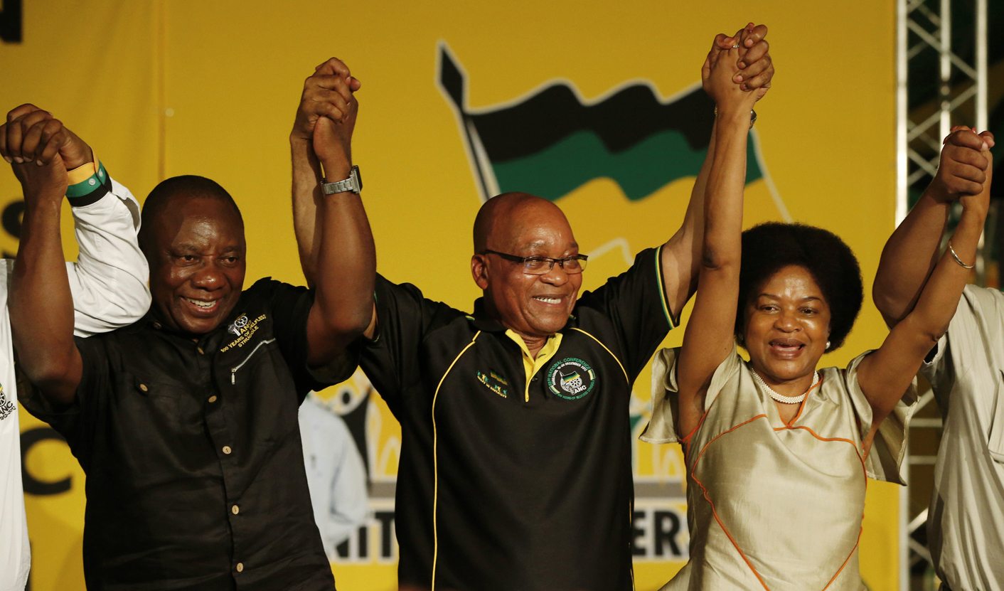 South Africa's President Zuma celebrates his re-election as party President alongside newly-elected party Deputy President Ramaphosa and re-elected Chairperson Mbete at the National Conference of the ruling African National Congress (ANC) in Bloemfontein