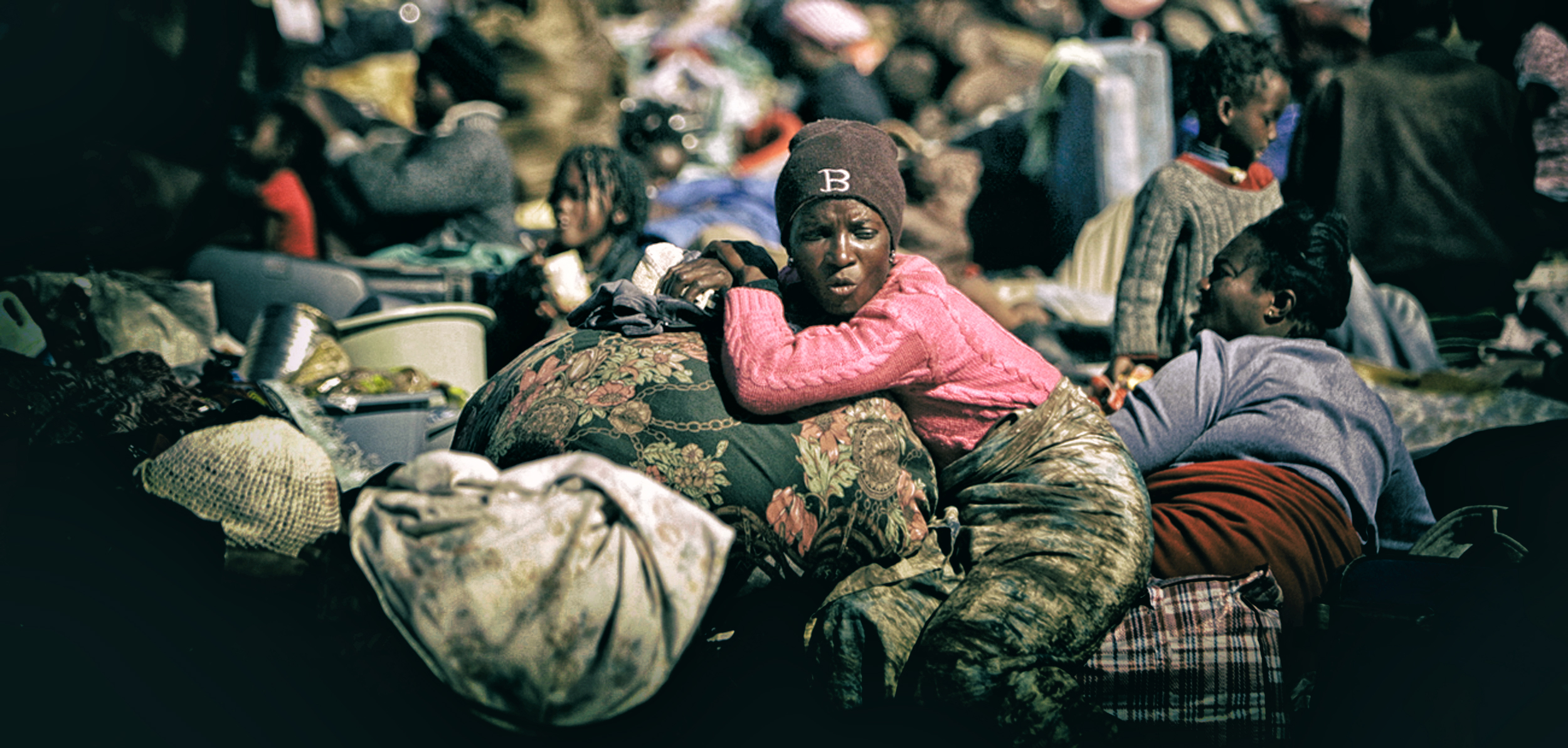 Fearful foreign nationals hide indoors after two looters shot dead during xenophobic attacks in Durban