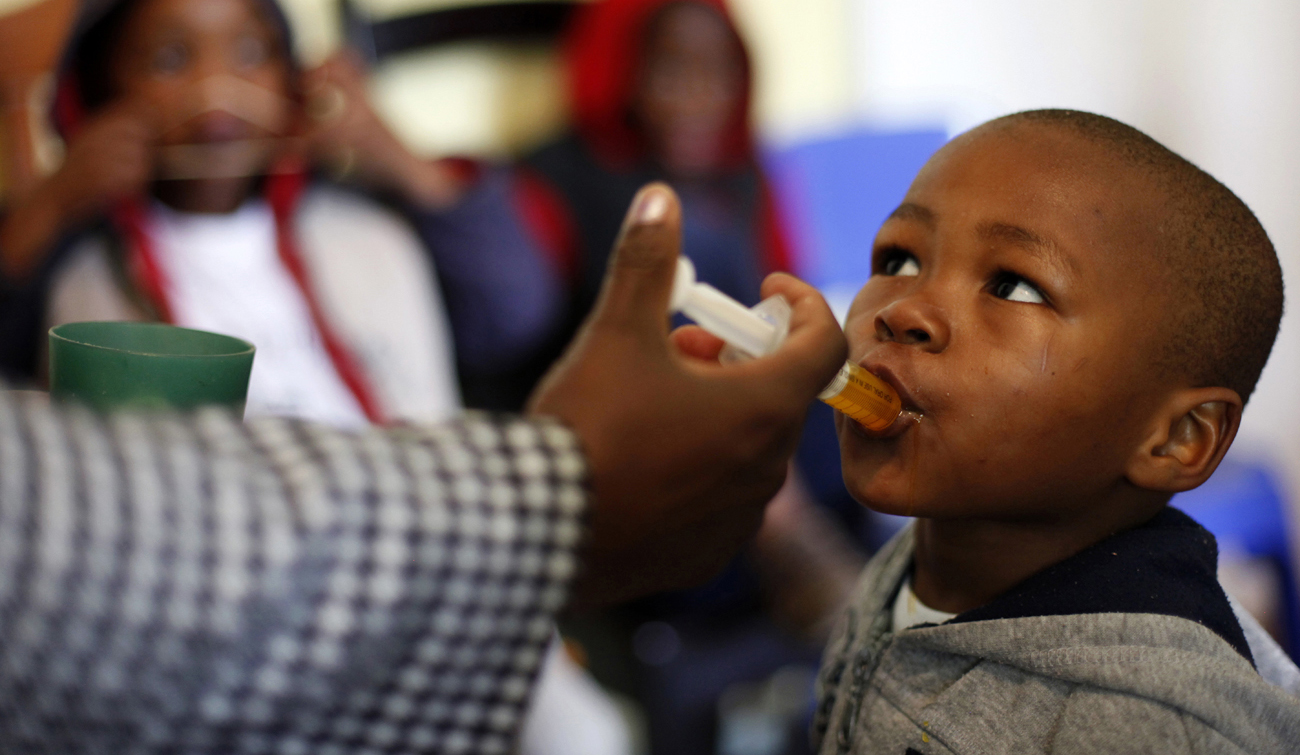 A boy receives medication at Nkosi's Haven, south of Johannesburg