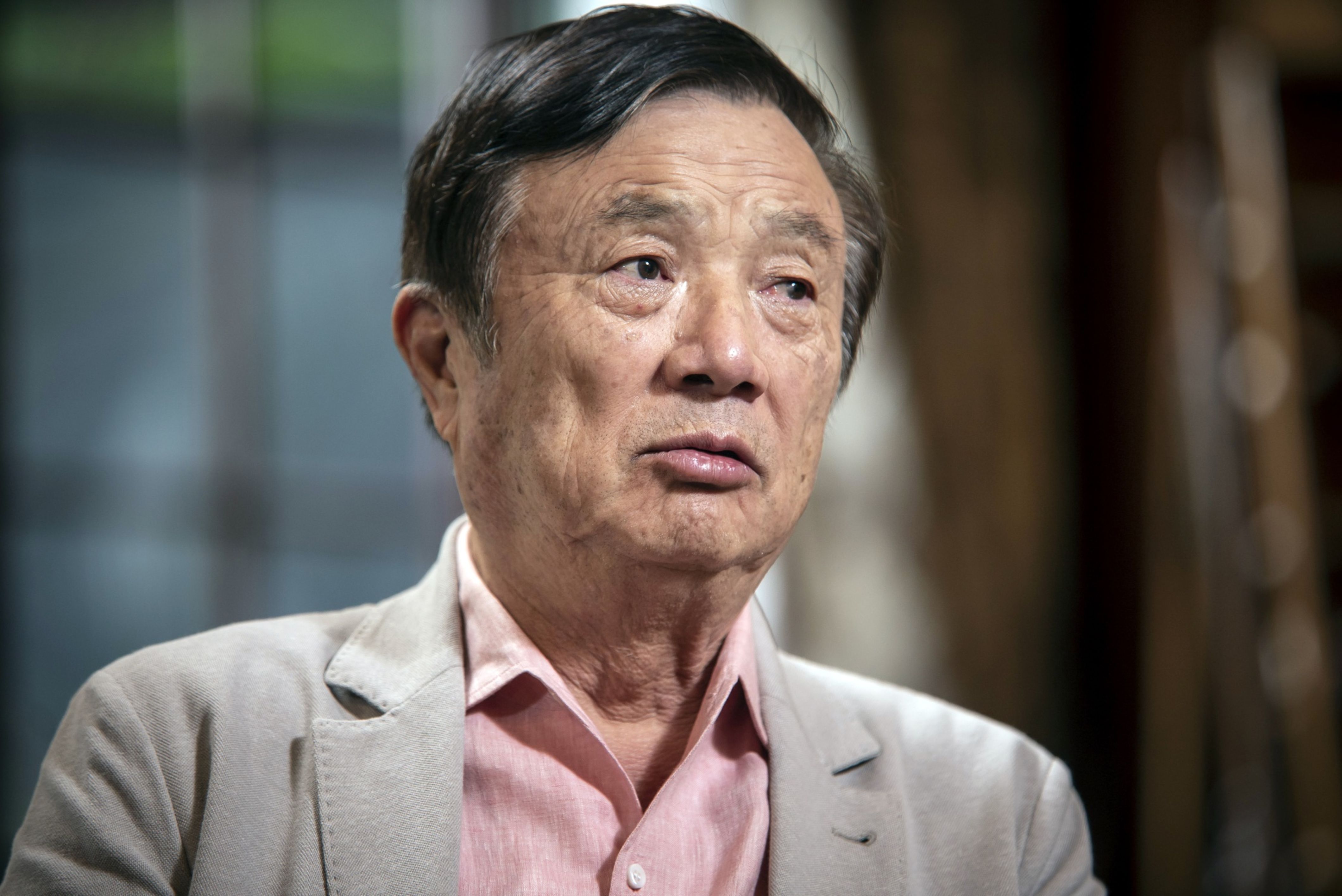 Billionaire Huawei Founder Ren Zhenfei Defiant in Face of Existential Threat