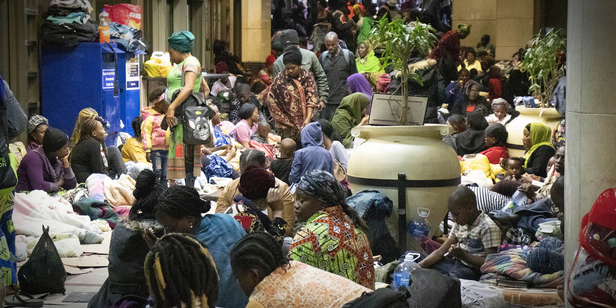 Queues of foreign nationals at UN offices illustrate the desperation to leave South Africa