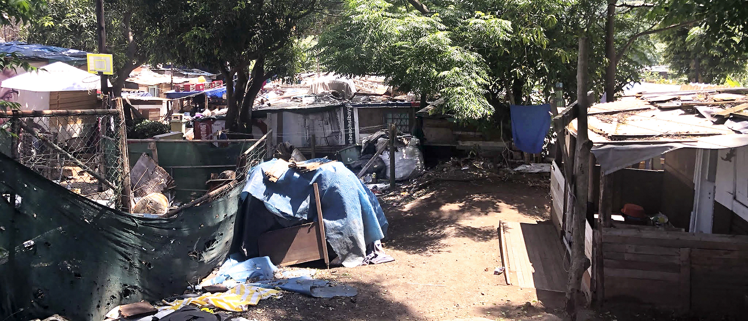 Take four shipping containers, plant the seed of hope, water with education