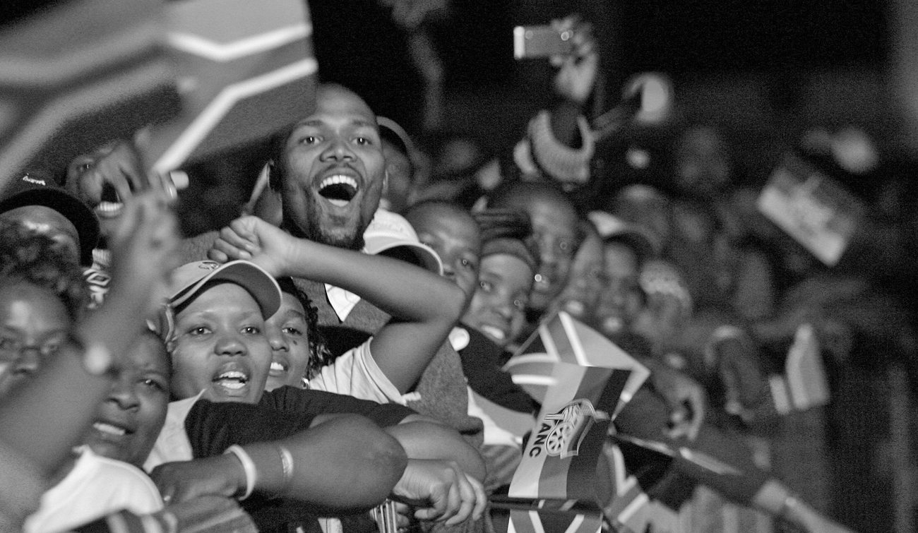 ANC supporters celebrate during victory celebrations at Nasrec in Johannesburg