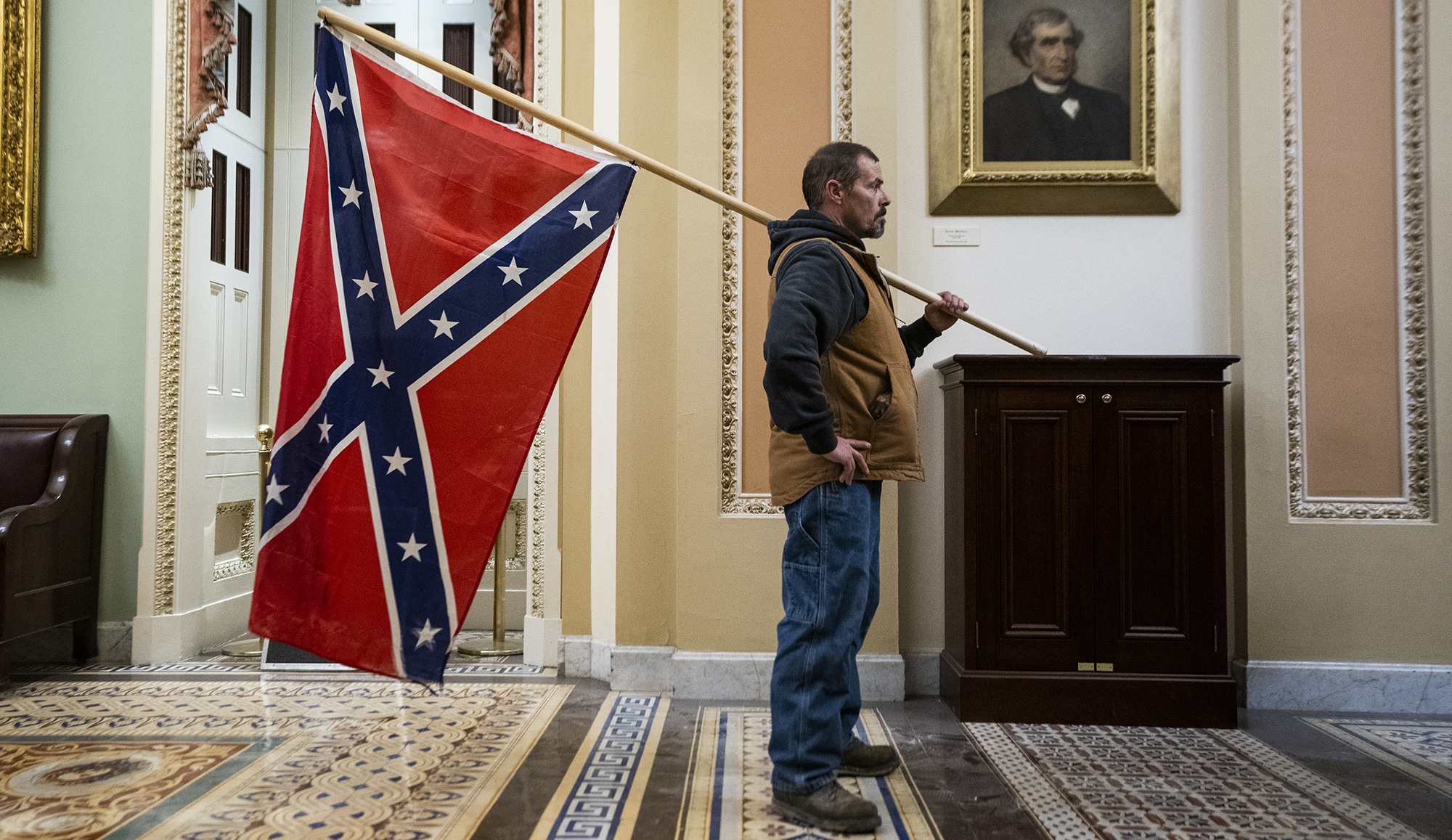 Racially motivated extremists and ‘inspired believers’ joined Capitol riot, says FBI chief