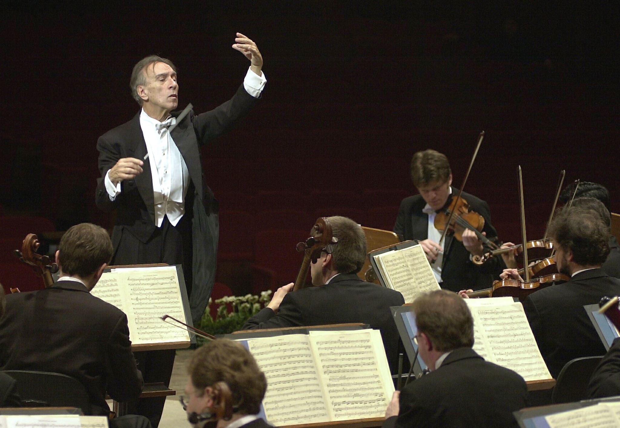 Italian conductor Claudio Abbado conducts the Berliner Philharmonic Orchestra during rehearsal in Ro..