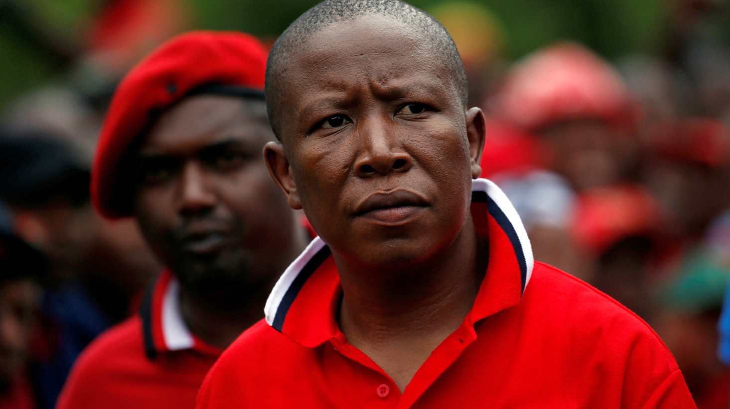 Economic Freedom Fighters party leader Julius Malema arrives with supporters for a demonstration in Pretoria