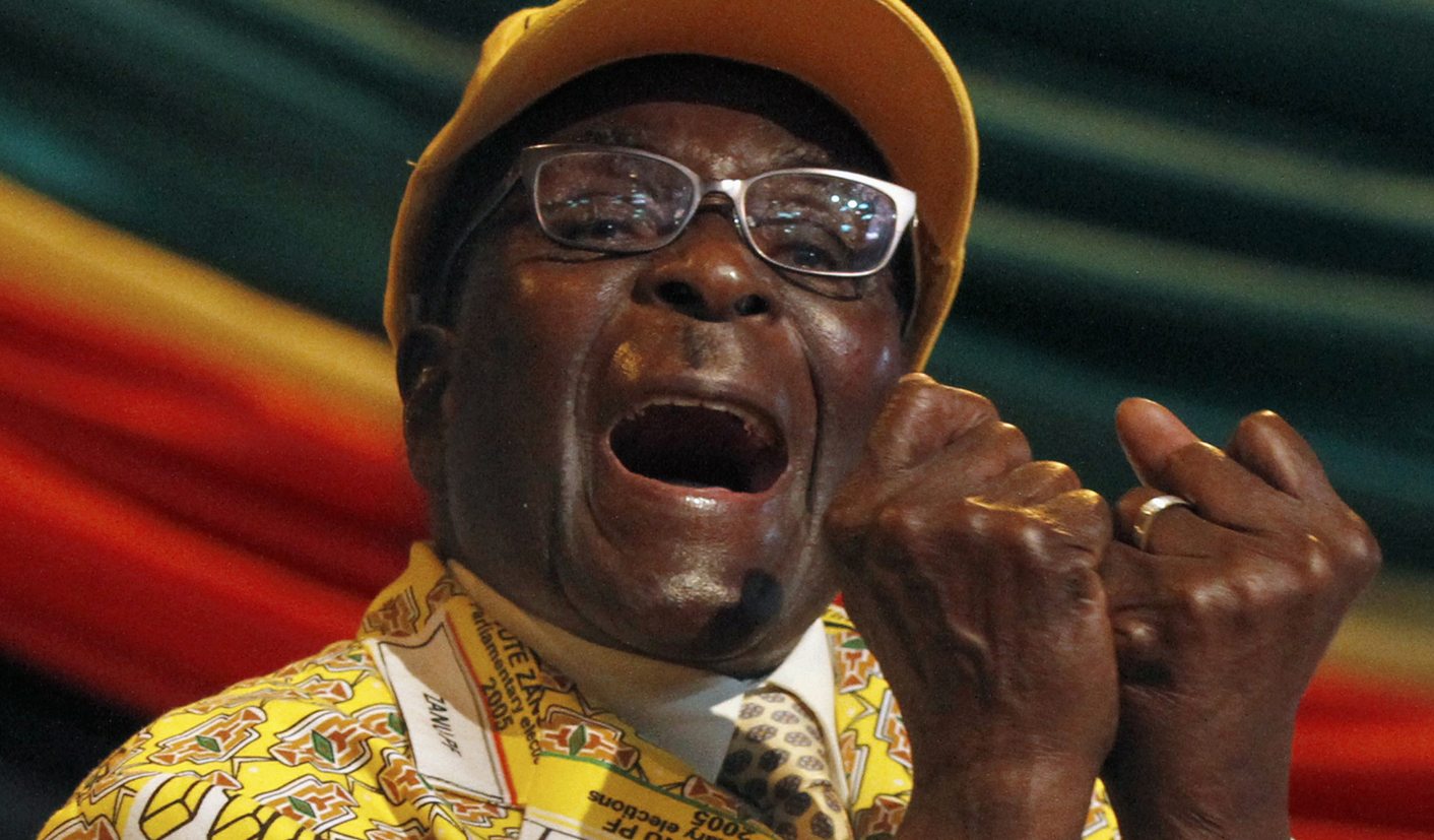 Zimbabwe's President Robert Mugabe gestures during his address at the annual conference of his ZANU-PF party in Gweru