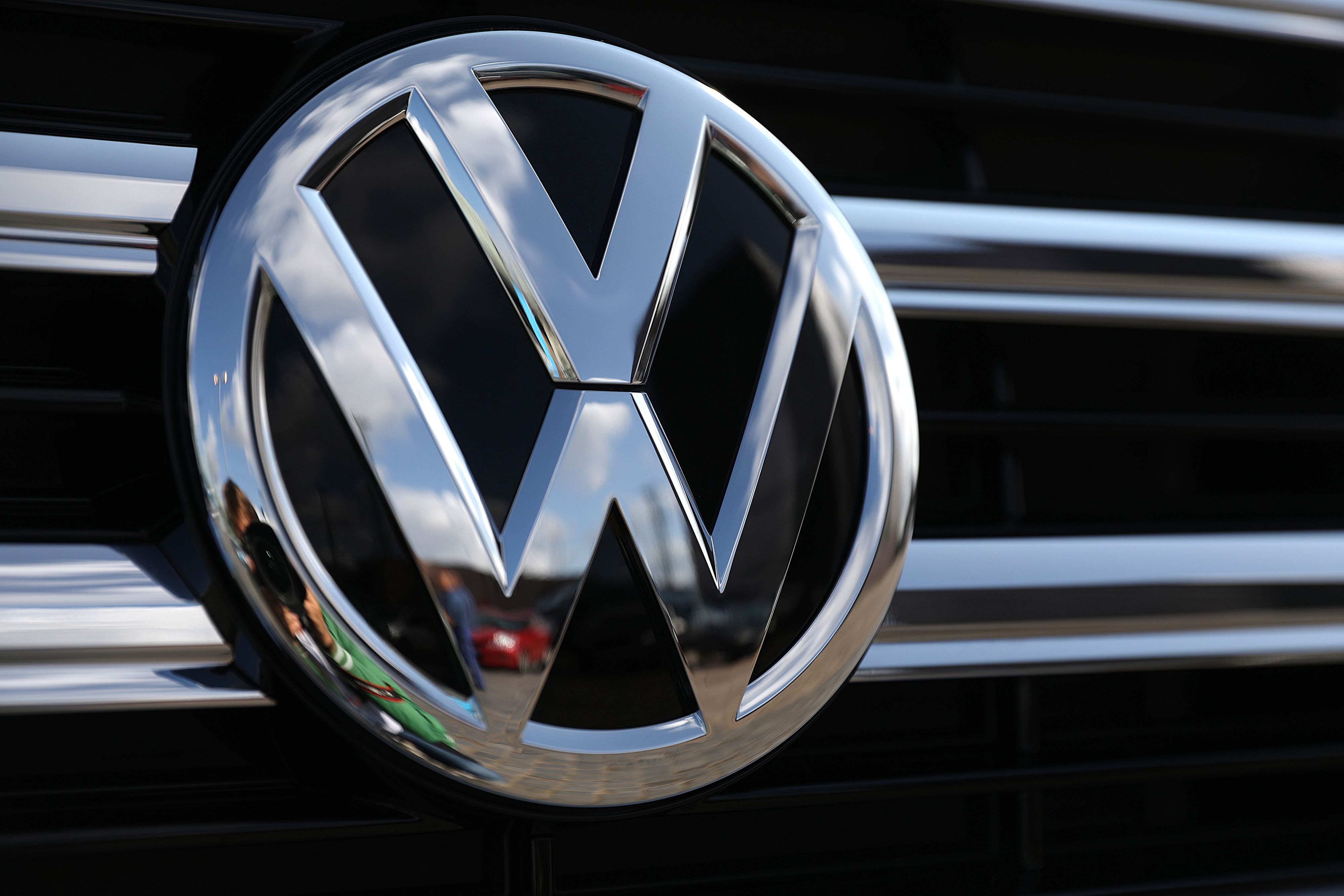 VW Unveils New Logo, Affordable Electric Cars in Show of New Era