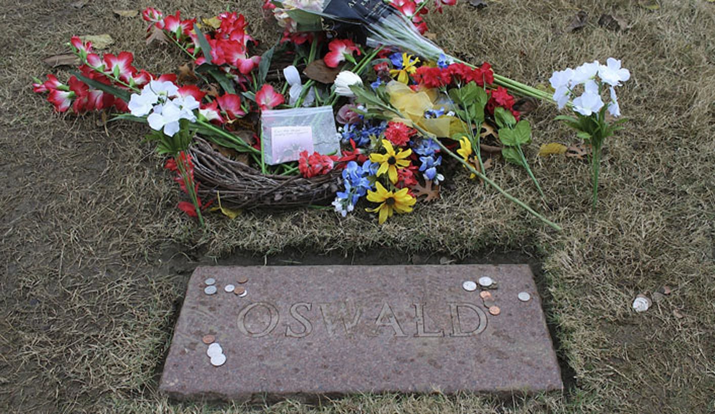 The curious and the skeptical mark murder anniversary at Oswald grave