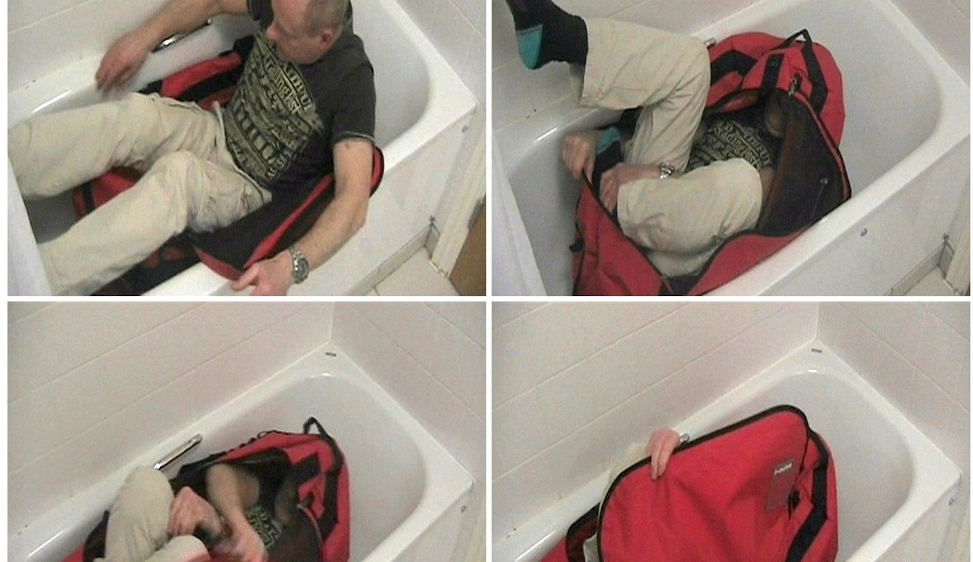 Death of British spy found padlocked in bag was accidental