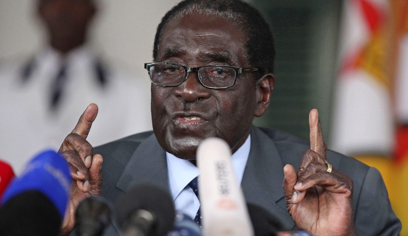 Zimbabwe's President Mugabe addresses a media conference at State house in Harare, on the eve of the country's general elections