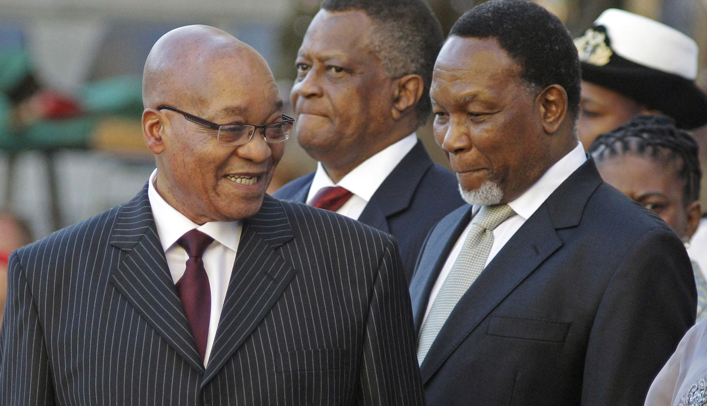South African President Jacob Zuma waits with his wife MaKhumalo and Deputy President Kgalema Motlanthe before his State of the Nation address at Parliament in Cape Town