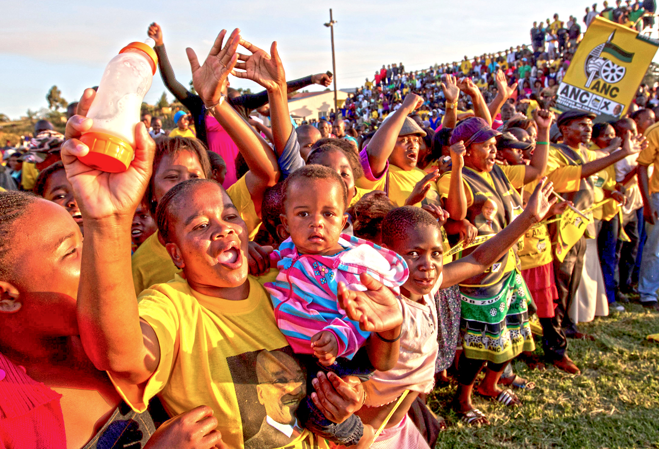 Supporters greet South African President Zuma as he campaigns in Richmond