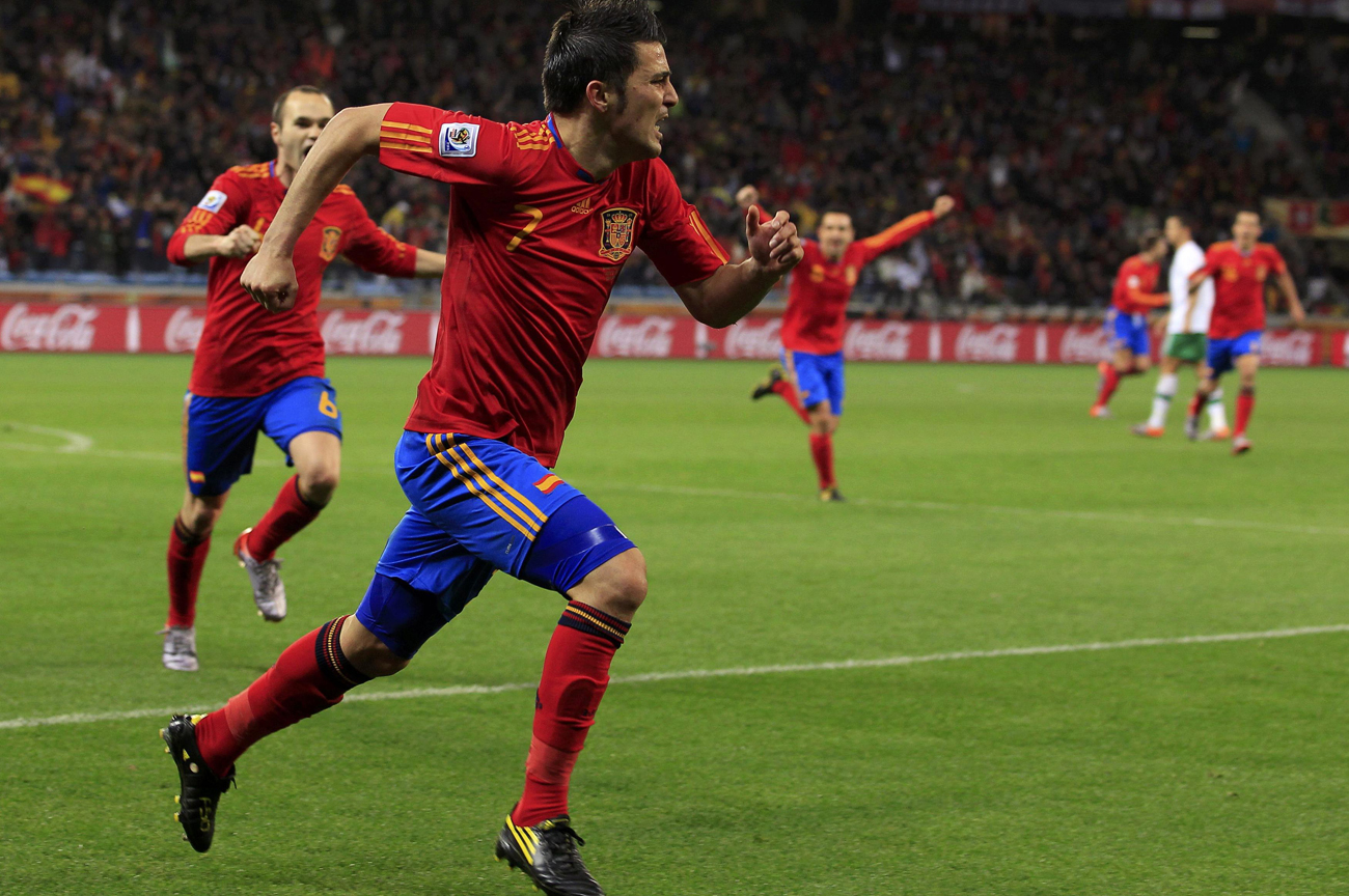 Jubilant Spain finally bring down Portugal's defences