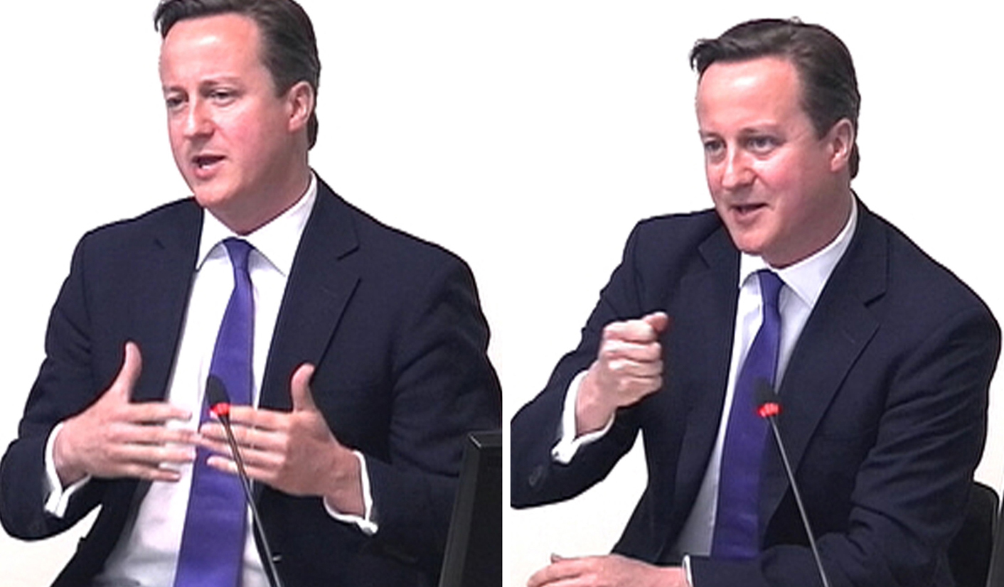 A combination of still video images show Britain's Prime Minister David Cameron as he gives evidence to the Leveson Inquiry at the High Court in London