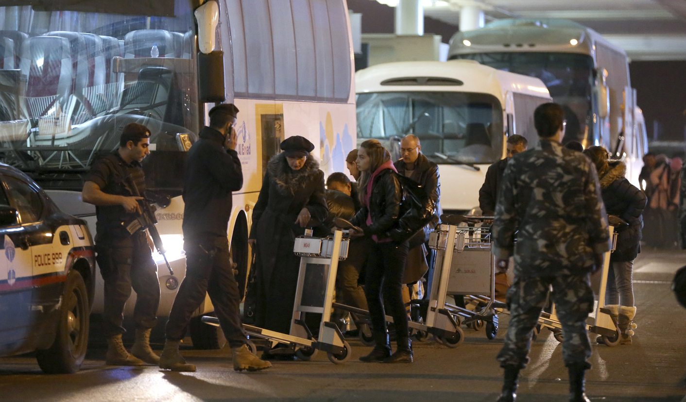 Russians evacuate from Syria, Moscow denies mass exodus