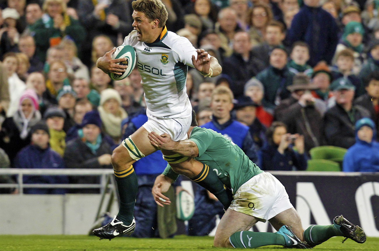 South Africa's Juan Smith goes over for a try against Ireland during the Guinness Autumn Series 2010 rugby international in Dublin