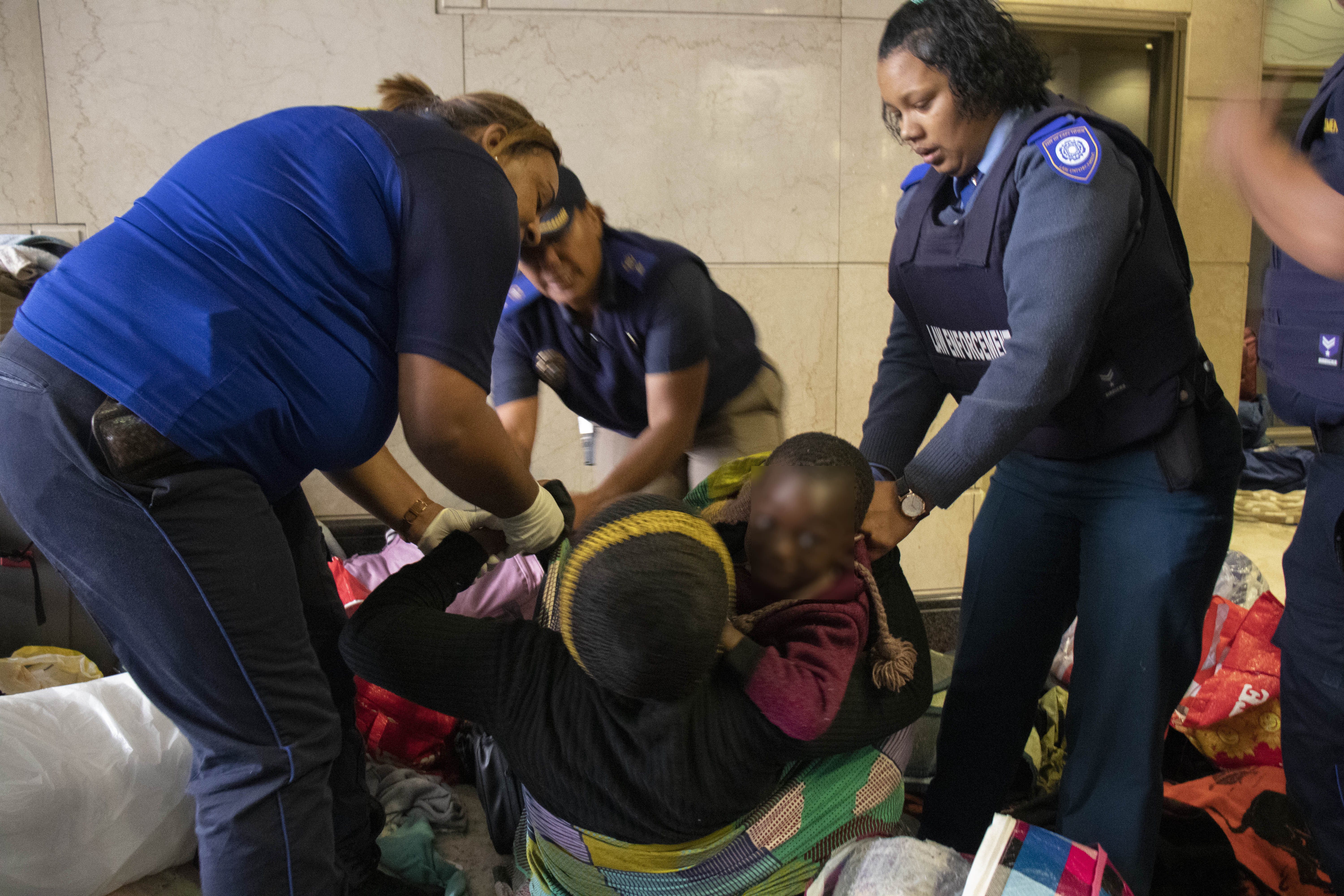 Children yanked from mothers’ arms in Cape Town as police break up migrant sit-in