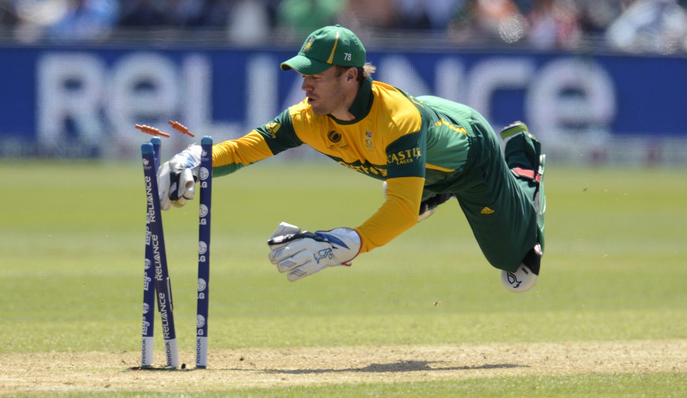 South Africa's De Villiers dives in an attempted run out during the ICC Champions Trophy group B match against India at Cardiff Wales Stadium in Cardiff